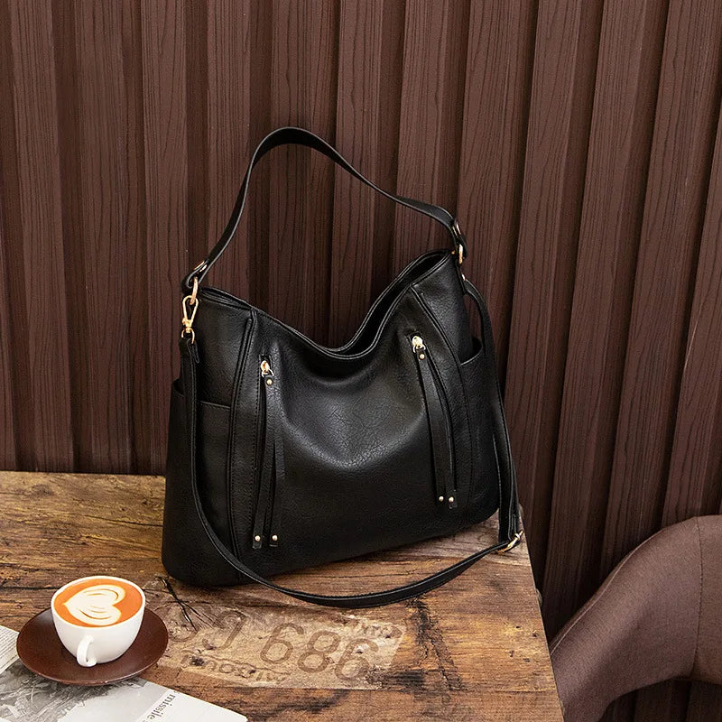 Damska Skórzana Torba Crossbody | Elegancka i Funkcjonalna Listonoszka na Ramię